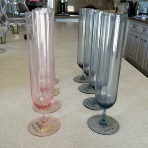 NWT Anthropologie set of 8 hand blown champagne flutes (4 pink and 4 blue).